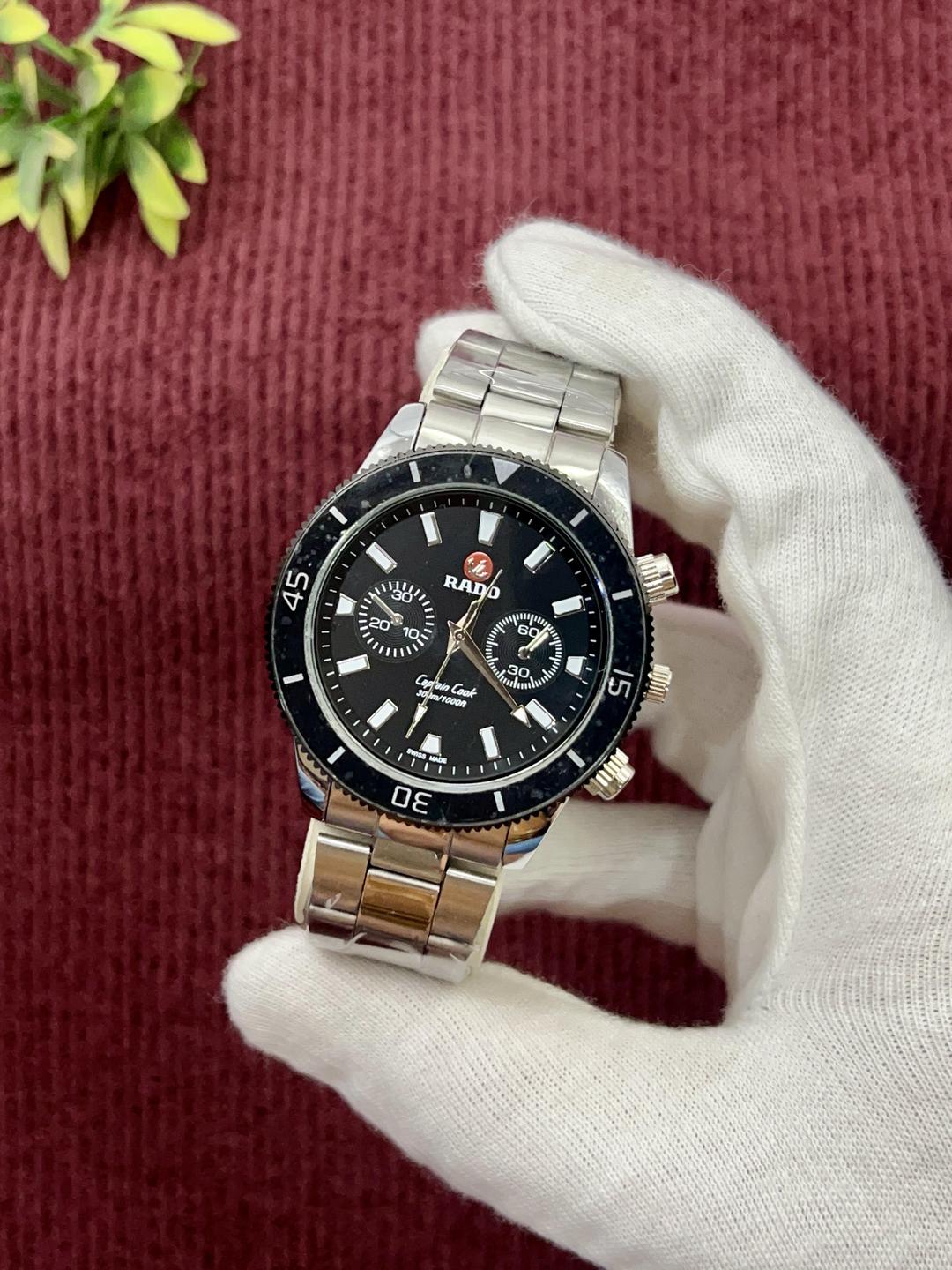 Stainless Steel Chronograph Watch Black Dial Gold Strap.
